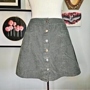 Green corduroy mini skirt